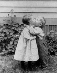 Little Boy and Girl Kissing