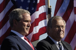 George W Bush and Donald H Rumsfeld