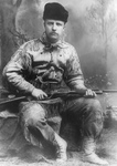 Theodore Roosevelt Holding a Rifle