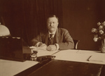 Theodore Roosevelt Sitting at Desk