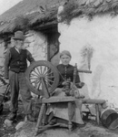 Couple With a Spinning Wheel