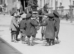 Children Playing Ring Around a Rosie