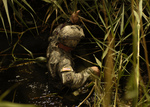Army Soldier Wading in Water