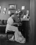 Ethel Barrymore Playing a Piano