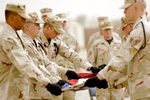 Honor Guardsmen Folding a Flag
