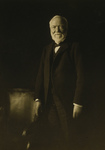 Andrew Carnegie Standing by a Chair