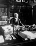 Andrew Carnegie Reading at a Desk