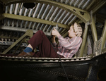 Picture of a Woman Riveting an A-20 Bomber