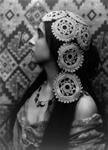 Woman in Profile, Crochet in Her Hair