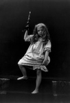 Little Girl in a Nightgown, Holding a Candle