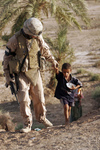 Soldier With an Iraqi Child
