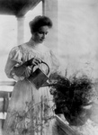 Helen Keller Watering a Plant