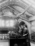 Anne Sullivan and Helen Keller Near a Statue