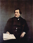 Photo of Gioachino Antonio Rossini Seated With Sheet Music