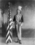 Photo of Uncle Sam Standing Beside the American Flag, 1898