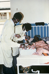 Doctors Giving Health Care to a Female Lassa Fever Patient in the Segbwema, Sierra Leone Clinic