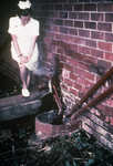 Nurse Standing Near Sewage Pipes Outside of an Infectious Disease Hospital in Johannesburg, South Africa