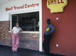 Man and Woman Standing Outside of a Shell Gas Station Where Two People Became Ill with the Marburg Virus