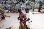 African Child Being Vaccinated for Measles and Smallpox in a Relief Camp Outside of a War Zone in Nigeria