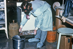Technician Discarding Blood Specimens Collected During The Ebola Outbreak In Zaire, 1976