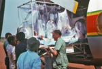 Plastic Ebola Virus Isolator Being Loaded Into a Plane