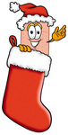 Clip art Graphic of a Bandaid Bandage Cartoon Character Wearing a Santa Hat Inside a Red Christmas Stocking