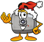 Clip Art Graphic of a Flash Camera Cartoon Character Wearing a Santa Hat and Waving