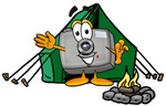 Clip Art Graphic of a Flash Camera Cartoon Character Camping With a Tent and Fire
