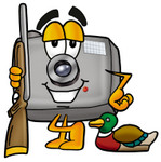 Clip Art Graphic of a Flash Camera Cartoon Character Duck Hunting, Standing With a Rifle and Duck