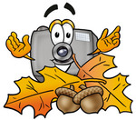 Clip Art Graphic of a Flash Camera Cartoon Character With Autumn Leaves and Acorns in the Fall