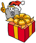 Clip Art Graphic of a Flash Camera Cartoon Character Standing by a Christmas Present