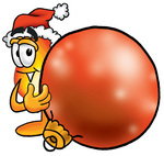 Clip Art Graphic of a Fire Cartoon Character Wearing a Santa Hat, Standing With a Christmas Bauble