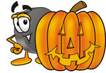 Clip Art Graphic of an Ice Hockey Puck Cartoon Character With a Carved Halloween Pumpkin