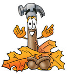 Clip Art Graphic of a Hammer Tool Cartoon Character With Autumn Leaves and Acorns in the Fall