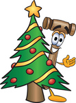 Clip Art Graphic of a Wooden Mallet Cartoon Character Waving and Standing by a Decorated Christmas Tree