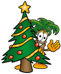 Clip Art Graphic of a Tropical Palm Tree Cartoon Character Waving and Standing by a Decorated Christmas Tree