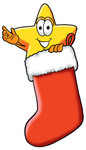 Clip Art Graphic of a Yellow Star Cartoon Character Inside a Red Christmas Stocking