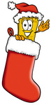 Clip Art Graphic of a Golden Admission Ticket Character Wearing a Santa Hat Inside a Red Christmas Stocking