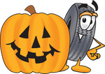 Clip Art Graphic of a Tire Character With a Carved Halloween Pumpkin