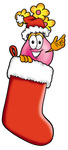 Clip Art Graphic of a Pink Vase And Yellow Flowers Cartoon Character Wearing a Santa Hat Inside a Red Christmas Stocking