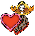 Clip Art Graphic of a Yellow Safety Hardhat Cartoon Character With an Open Box of Valentines Day Chocolate Candies
