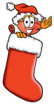 Clip Art Graphic of a Plumbing Toilet or Sink Plunger Cartoon Character Wearing a Santa Hat Inside a Red Christmas Stocking