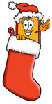 Clip Art Graphic of a Red and Yellow Sales Price Tag Cartoon Character Wearing a Santa Hat Inside a Red Christmas Stocking