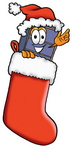 Clip Art Graphic of a Suitcase Luggage Cartoon Character Wearing a Santa Hat Inside a Red Christmas Stocking
