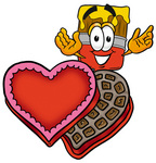 Clip Art Graphic of a Red Paintbrush With Yellow Paint Cartoon Character With an Open Box of Valentines Day Chocolate Candies