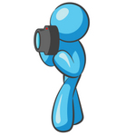 Clip Art Graphic of a Sky Blue Guy Character Taking Pictures